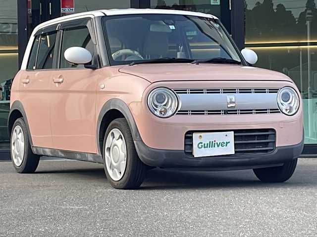 スズキ ラパン S 鹿児島県 2017(平29)年 6.4万km コフレピンクパールメタリック/ホワイト2トーンルーフ 横滑り防止装置/純正ナビ/　　CD/DVD/BT/フルセグ/アラウンドビューモニター、バックカメラ、サイドカメラ/オートライト/シートヒーター/アイドリングストップ/スマートキー