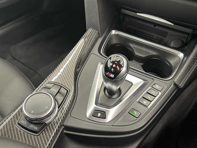 ＢＭＷ Ｍ４ クーペ 富山県 2016(平28)年 4.5万km シルバー 純正HDDナビ/リアカメラ/フルセグ/Bluetooth/HUD/衝突警告/インテリジェントセーフティー/車線逸脱警告/Mドライブセレクト/社外19インチAW/カーボンインテリアトリム/カーボンステアリング/黒本革シート/ミラー一体型ETC/パドルシフト/コンフォートアクセス/LEDヘッドライト/オートライト/ドラレコ（F）