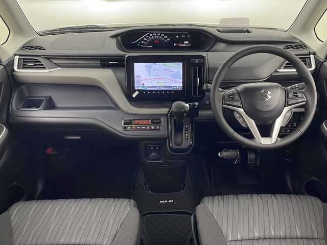 スズキ ソリオ HV MZ 秋田県 2025(令7)年 0.1千km キャラバンアイボリーパールM / ガンメタリック2トーン ４WD/メモリ純正ナビ(Bluetooth/CD/DVD/フルセグ)/全方位カメラ/両側パワースライドドア/前席シートヒーター/前後コーナーセンサー/アイドリングストップ/レーンキープアシスト/クルーズコントロール/車線逸脱警報/クリアランスソナー/オートマチックハイビーム/衝突被害軽減システム/横滑り防止装置/純正AW/サンシュード/LEDヘッドライト/スマートキー/スペアキー