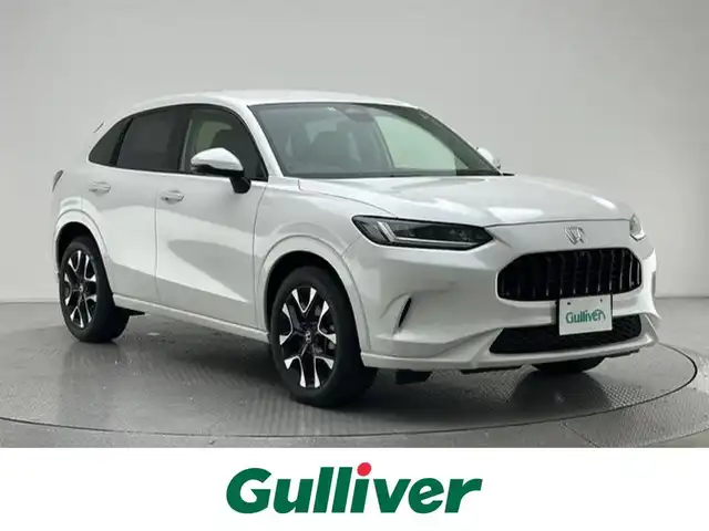 ホンダ ＺＲ－Ｖ 兵庫県 2022(令4)年 1.1万km プラチナホワイトパール 純正メモリナビ(Bluetooth/USB/フルセグ/スマートフォン連携)/全方位カメラ/BOSEサウンド/パドルシフト/レザーシート/パワーシート/シートヒーター/パワーバックドア/ワイヤレス充電/追従型クルーズコントロール/ブラインドスポットモニター/ステアリングヒーター/純正18インチアルミホイール/純正フロアマット/コーナーセンサー/ビルトインETC