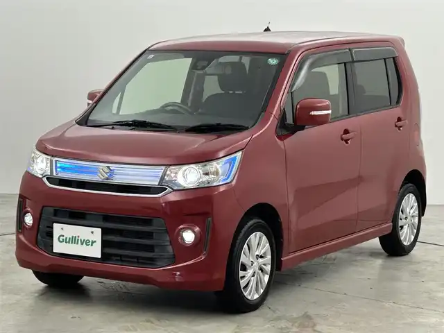 スズキ ワゴンＲ スティングレー X 福岡県 2015(平27)年 7.5万km フェニックスレッドパール 社外ナビ（Ｂｌｕｅｔｏｏｔｈ，フルセグＴＶ）　/ＥＴＣ　/デジタルミラー型ドラレコ　/衝突軽減ブレーキ　/横滑り防止装置　/アイドリングストップ　/シートヒーター　/純正フロアマット　/純正１４インチアルミホイール