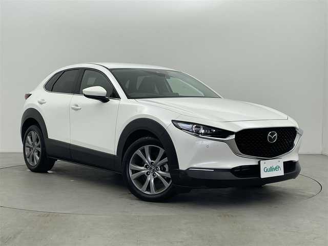 マツダ ＣＸ－３０ XD Lパッケージ 富山県 2021(令3)年 4.9万km スノーフレイクホワイトパールマイカ 純正ナビ（AM/FM/BT/USB/HDMI）/バックカメラ/ドライブレコーダー/ETC/ブラインドスポットモニター/ヘッドアップディスプレイ/レザーシート/D席パワーシート/D席メモリシート/シートヒーター/ハンドルヒーター/衝突被害軽減システム/レーダークルーズコントロール/レーンキープアシスト/コーナーセンサー/横滑り防止装置/アイドリングストップ/純正アルミホイール/純正フロアマット/オートLEDライト/オートホールド付電子パーキング/革巻きステアリング/ステアリングスイッチ/パドルシフト