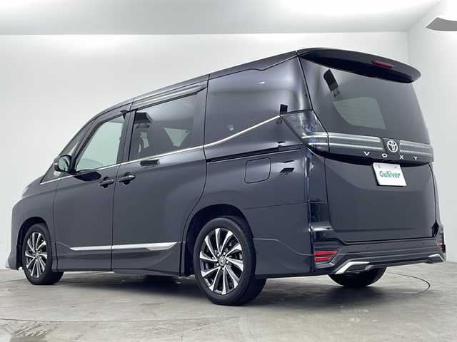 トヨタ ヴォクシー S－Z 鹿児島県 2024(令6)年 2万km アティチュードブラックマイカ Toyota Safety Sense/純正10型ディスプレィオーディオ/ナビ Bluetooth DVD再生可/全方位カメラ/純正14型フリップダウンモニター /両側電動スライドドア/レーダークルーズコントロール/ブラインドスポットモニター/ハーフレザーシート/前席シートヒーター /ステアリングヒーター/ステアリングスイッチ/LEDヘッドライト/オートライトコントロール/純正17インチアルミホイール/スマートキー×2/エンジンプッシュスタート/保証書/取扱説明書
