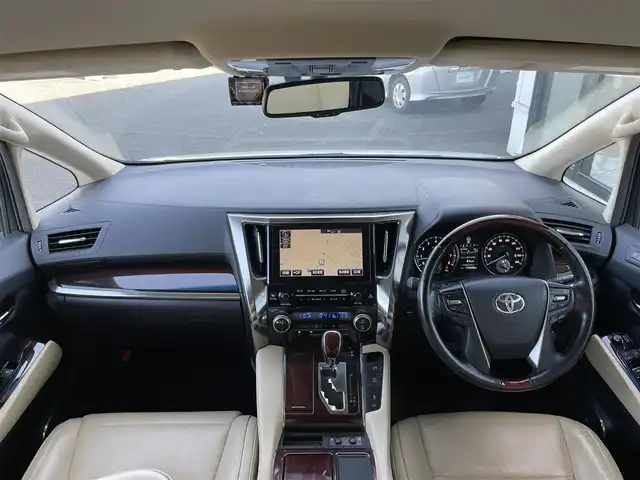トヨタ ヴェルファイア VL 道央・札幌 2017(平29)年 11.4万km ホワイトパールクリスタルシャイン ４ＷＤ/寒冷地仕様/純正ナビ/【ＣＤ／ＤＶＤ／ＢＤ／ＳＤ／ＵＳＢ／フルセグＴＶ】/ＪＢＬプレミアムサウンド/純正フリップダウンモニター/バックカメラ／全方位カメラ/ブレーキアシスト/インテリジェントクリアランスソナー/レーダークルーズコントロール/オートハイビーム/オートライト/ＬＥＤ/フォグランプ/リアフォグランプ/ウィンカーミラー/フロントワイパーデアイサー/コンビステアリング/ステアリングヒーター/ステアリングスイッチ/レインセンサー/前席シートヒーター/全席パワーシート/セカンドシートＡＣ１００Ｖ差込口あり/運転席シートメモリ/パワーバックドア/オートブレーキホールド/横滑り防止装置/オート電動格納ミラー/プッシュスタート/ナノイー/スマートキー/純正エンジンスターター/純正フロアマット/新車時保証書/ビルトインＥＴＣ