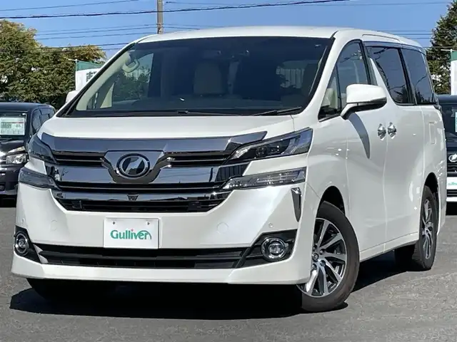 トヨタ ヴェルファイア VL 道央・札幌 2017(平29)年 11.4万km ホワイトパールクリスタルシャイン ４ＷＤ/寒冷地仕様/純正ナビ/【ＣＤ／ＤＶＤ／ＢＤ／ＳＤ／ＵＳＢ／フルセグＴＶ】/ＪＢＬプレミアムサウンド/純正フリップダウンモニター/バックカメラ／全方位カメラ/ブレーキアシスト/インテリジェントクリアランスソナー/レーダークルーズコントロール/オートハイビーム/オートライト/ＬＥＤ/フォグランプ/リアフォグランプ/ウィンカーミラー/フロントワイパーデアイサー/コンビステアリング/ステアリングヒーター/ステアリングスイッチ/レインセンサー/前席シートヒーター/全席パワーシート/セカンドシートＡＣ１００Ｖ差込口あり/運転席シートメモリ/パワーバックドア/オートブレーキホールド/横滑り防止装置/オート電動格納ミラー/プッシュスタート/ナノイー/スマートキー/純正エンジンスターター/純正フロアマット/新車時保証書/ビルトインＥＴＣ