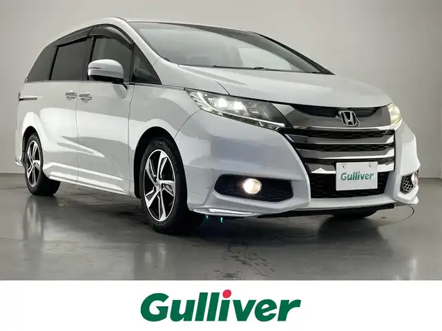 ホンダ オデッセイ アブソルート 愛知県 2013(平25)年 6.4万km ホワイトオーキッドパール 純正ナビ/HDMI/両側パワースライドドア/ETC/パドルシフト/黒ハーフレザーシート/バックカメラ/クルーズコントロール/DVD/LEDオートライト/フォグランプ/純正アルミホイール/カーテンエアバック/純正フロアマット/禁煙車