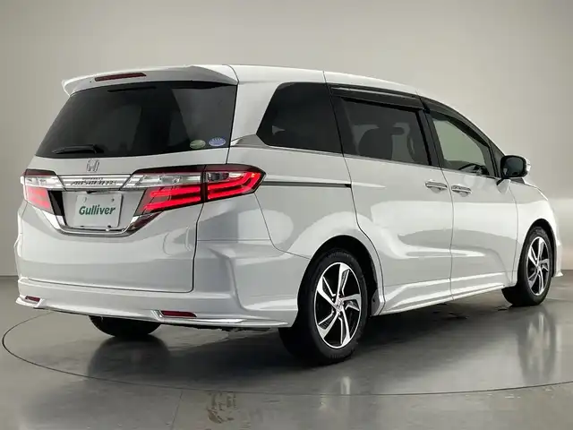 ホンダ オデッセイ アブソルート 愛知県 2013(平25)年 6.4万km ホワイトオーキッドパール 純正ナビ/HDMI/両側パワースライドドア/ETC/パドルシフト/黒ハーフレザーシート/バックカメラ/クルーズコントロール/DVD/LEDオートライト/フォグランプ/純正アルミホイール/カーテンエアバック/純正フロアマット/禁煙車