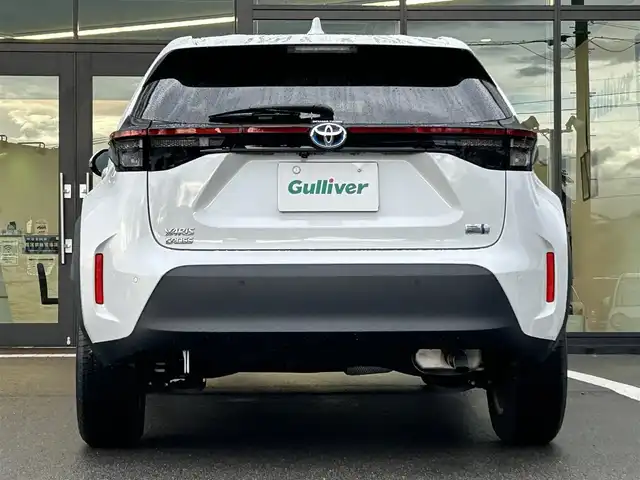 トヨタ ヤリスクロス ハイブリッド G 愛媛県 2023(令5)年 1.9万km プラチナホワイトパールマイカ 純正ディスプレイオーディオ/ETC/全方位モニターカメラ/追従型クルーズコントロール/ドライブレコーダー/前後コーナーセンサー/ABS/横滑り防止装置/レーンキープアシスト/衝突被害軽減システム/LEDヘッドライト/USB入力端子/純正16インチアルミホイール/純正フロアマット/純正ドアバイザー