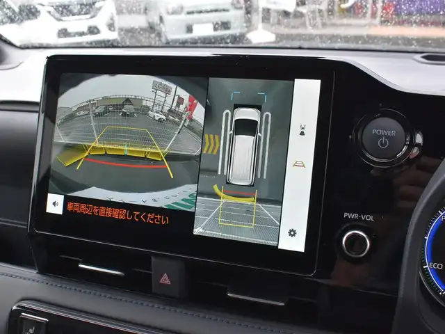 トヨタ ヴォクシー ハイブリッド S－Z 福岡県 2025(令7)年 0.2万km アティチュードブラックマイカ ワンオーナー/トヨタセーフティセンス/快適利便パッケージ(High)/純正OP10.5インチディスプレイオーディオ/フルセグ/CD/DVD/BT/HDMI/パノラミックビューモニター/純正OP13．2型後席ディスプレイ/純正OP3眼LEDヘッドライト/純正OPブラインドスポットモニター/純正OPアドバンストパーク/純正OPパーキングブレーキサポート/純正OPカラーヘッドアップディスプレイ/純正OPデジタルインナーミラー/純正ラグジュアリーフロアマット/純正GRスポーツサイドバイザー/TZ前後ドライブレコーダー/両側パワースライドドア/リア5面スモークフィルム/ビルトインETC2.0/新車時保証書/取扱説明書