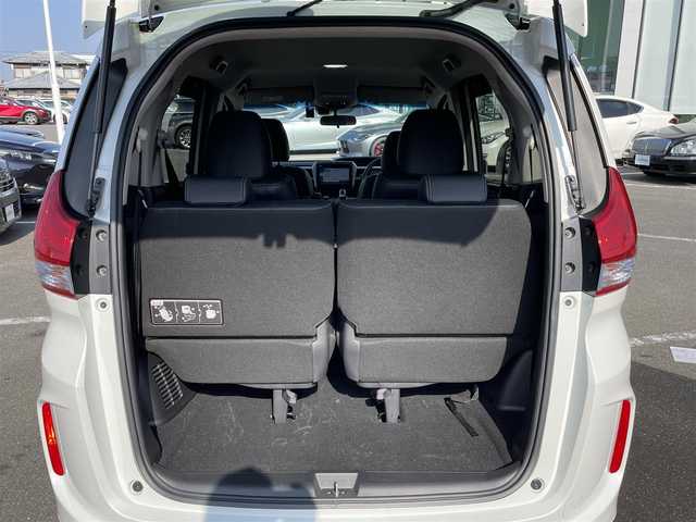 ホンダ フリード ハイブリット モデューロX ホンダセンシング 長崎県 2019(平31)年 6.6万km ホワイトオーキッドパール ワンオーナー/純正９型ナビ/（フルセグ・DVD・SD・BT・HDMI）/バックカメラ/ホンダセンシング/純正ドライブレコーダー/両側パワースライドドア/ハーフレザーシート/ETC/ステアリングスイッチ/レーンキープアシスト/LEDヘッドライト/オートライト/社外ツイーター/スペアキー