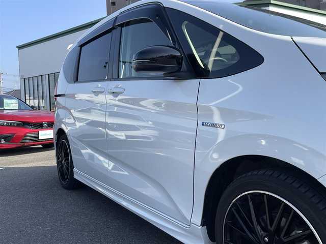 ホンダ フリード ハイブリット モデューロX ホンダセンシング 長崎県 2019(平31)年 6.6万km ホワイトオーキッドパール ワンオーナー/純正９型ナビ/（フルセグ・DVD・SD・BT・HDMI）/バックカメラ/ホンダセンシング/純正ドライブレコーダー/両側パワースライドドア/ハーフレザーシート/ETC/ステアリングスイッチ/レーンキープアシスト/LEDヘッドライト/オートライト/社外ツイーター/スペアキー
