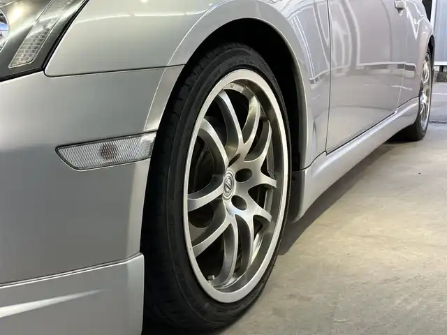 日産 スカイライン 350GT プレミアム 東京都 2005(平17)年 4.4万km ダイヤモンドシルバー 6速マニュアル車/イングスエアローパーツ/GIALLAグリル/IMPULブラストIIマフラー/社外スピーカー/純正MOMOステアリング/デジタルインナーミラー/ドライブレコーダー/電動格納ミラー/キーレスキー/スペアキー/キセノンライト/社外オーディオ/ETC/保証書・取扱説明書