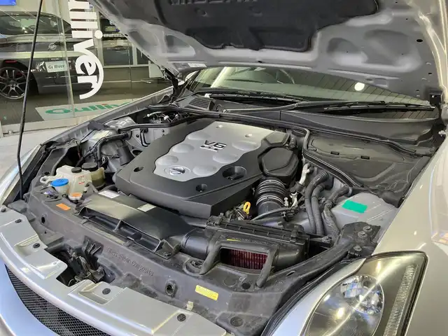 日産 スカイライン 350GT プレミアム 東京都 2005(平17)年 4.4万km ダイヤモンドシルバー 6速マニュアル車/イングスエアローパーツ/GIALLAグリル/IMPULブラストIIマフラー/社外スピーカー/純正MOMOステアリング/デジタルインナーミラー/ドライブレコーダー/電動格納ミラー/キーレスキー/スペアキー/キセノンライト/社外オーディオ/ETC/保証書・取扱説明書