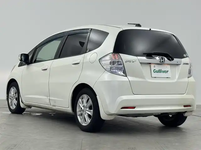 ホンダ フィット ハイブリット ナビ プレミアムセレクション 愛知県 2010(平22)年 11.7万km プレミアムホワイトパール 純正ナビ（ワンセグ、CD、DVD）/シートヒーター（D+N)/ETC/Bカメラ/純正アルミホイール/純正フロアマット/LEDヘッドライト/アイドリングストップ/オートライト/スマートキー/AAC