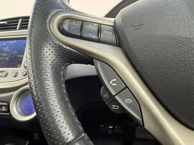 ホンダ フィット ハイブリット ナビ プレミアムセレクション 愛知県 2010(平22)年 11.7万km プレミアムホワイトパール 純正ナビ（ワンセグ、CD、DVD）/シートヒーター（D+N)/ETC/Bカメラ/純正アルミホイール/純正フロアマット/LEDヘッドライト/アイドリングストップ/オートライト/スマートキー/AAC