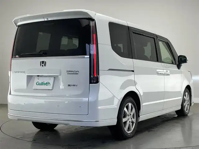 ホンダ ステップワゴン スパーダ eHEV プレミアムライン 愛知県 2024(令6)年 1.3万km プラチナホワイトパール 純正１１．４型ナビ　純正１５．６型後席モニター　デジタルインナーミラー　マルチビューカメラ　ＢＳＭ　電動リアゲート　ホンダセンシング　衝突軽減　追従クルコン　ハーフレザー　シートヒーター　ＬＥＤ　禁煙