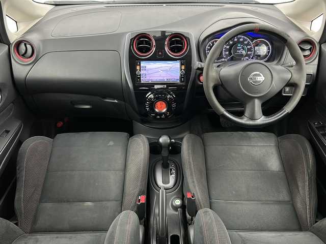 日産 ノート ニスモ 宮城県 2015(平27)年 8.9万km ダークメタルグレー 純正7インチナビ/・CD・DVD・Bluetooth・SD・AUX/フルセグTV/バックカメラ/革巻きステアリング/プッシュスタート/スマートキー/アイドリングストップ/HIDヘッドライト/フォグライト/純正フロアマット/純正１６インチAW/ドアバイザー/横滑り防止装置
