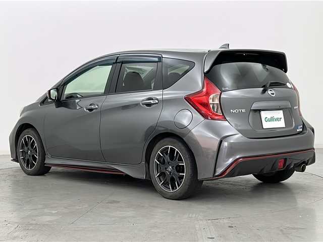 日産 ノート ニスモ 宮城県 2015(平27)年 8.9万km ダークメタルグレー 純正7インチナビ/・CD・DVD・Bluetooth・SD・AUX/フルセグTV/バックカメラ/革巻きステアリング/プッシュスタート/スマートキー/アイドリングストップ/HIDヘッドライト/フォグライト/純正フロアマット/純正１６インチAW/ドアバイザー/横滑り防止装置