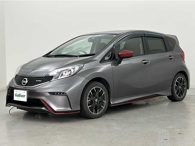 日産 ノート ニスモ 宮城県 2015(平27)年 8.9万km ダークメタルグレー 純正7インチナビ/・CD・DVD・Bluetooth・SD・AUX/フルセグTV/バックカメラ/革巻きステアリング/プッシュスタート/スマートキー/アイドリングストップ/HIDヘッドライト/フォグライト/純正フロアマット/純正１６インチAW/ドアバイザー/横滑り防止装置