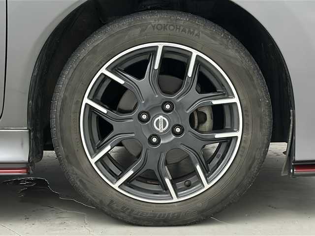 日産 ノート ニスモ 宮城県 2015(平27)年 8.9万km ダークメタルグレー 純正7インチナビ/・CD・DVD・Bluetooth・SD・AUX/フルセグTV/バックカメラ/革巻きステアリング/プッシュスタート/スマートキー/アイドリングストップ/HIDヘッドライト/フォグライト/純正フロアマット/純正１６インチAW/ドアバイザー/横滑り防止装置