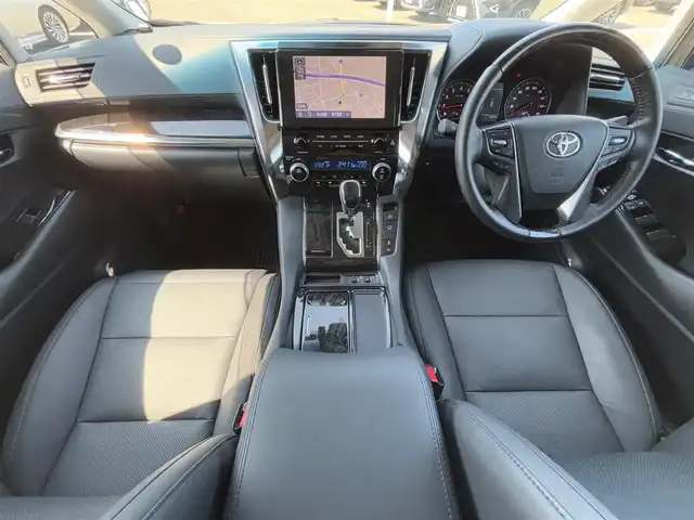 トヨタ アルファード S Cパッケージ 徳島県 2022(令4)年 1.6万km ホワイトパールクリスタルシャイン ツインムーンルーフ/純正9インチメーカーオプションナビ/　フルセグ(キャンセラー 有)/BT/  /AppleCarPlay/AndroidAuto/バックカメラ/デジタルインナーミラー/ブラインドスポットモニター/シーケンシャルウィンカー/衝突被害軽減ブレーキ/アダプティブクルーズコントロール/レーンキープアシスト/両側パワースライドドア/黒革レザーシート/全席パワーシート/シートヒーター/エアシート/ステアリングヒーター/三眼LEDヘッドライト/オートライト/オートマチックハイビーム/フォグランプ/電子パーキング/オートホールド/ETC2.0/前後ドライブレコーダー/純正18インチアルミホイール/純正フロアマット/スマートキー２本