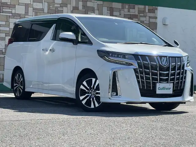 トヨタ アルファード S Cパッケージ 徳島県 2022(令4)年 1.6万km ホワイトパールクリスタルシャイン ツインムーンルーフ/純正9インチメーカーオプションナビ/　フルセグ(キャンセラー 有)/BT/  /AppleCarPlay/AndroidAuto/バックカメラ/デジタルインナーミラー/ブラインドスポットモニター/シーケンシャルウィンカー/衝突被害軽減ブレーキ/アダプティブクルーズコントロール/レーンキープアシスト/両側パワースライドドア/黒革レザーシート/全席パワーシート/シートヒーター/エアシート/ステアリングヒーター/三眼LEDヘッドライト/オートライト/オートマチックハイビーム/フォグランプ/電子パーキング/オートホールド/ETC2.0/前後ドライブレコーダー/純正18インチアルミホイール/純正フロアマット/スマートキー２本