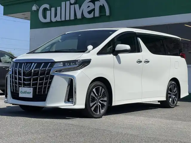 トヨタ アルファード S Cパッケージ 徳島県 2022(令4)年 1.6万km ホワイトパールクリスタルシャイン ツインムーンルーフ/純正9インチメーカーオプションナビ/　フルセグ(キャンセラー 有)/BT/  /AppleCarPlay/AndroidAuto/バックカメラ/デジタルインナーミラー/ブラインドスポットモニター/シーケンシャルウィンカー/衝突被害軽減ブレーキ/アダプティブクルーズコントロール/レーンキープアシスト/両側パワースライドドア/黒革レザーシート/全席パワーシート/シートヒーター/エアシート/ステアリングヒーター/三眼LEDヘッドライト/オートライト/オートマチックハイビーム/フォグランプ/電子パーキング/オートホールド/ETC2.0/前後ドライブレコーダー/純正18インチアルミホイール/純正フロアマット/スマートキー２本