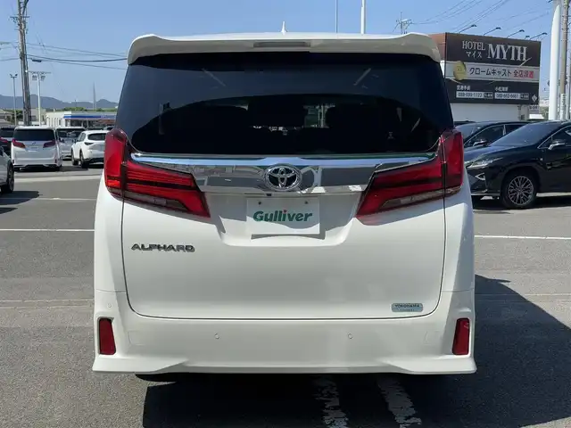 トヨタ アルファード S Cパッケージ 徳島県 2022(令4)年 1.6万km ホワイトパールクリスタルシャイン ツインムーンルーフ/純正9インチメーカーオプションナビ/　フルセグ(キャンセラー 有)/BT/  /AppleCarPlay/AndroidAuto/バックカメラ/デジタルインナーミラー/ブラインドスポットモニター/シーケンシャルウィンカー/衝突被害軽減ブレーキ/アダプティブクルーズコントロール/レーンキープアシスト/両側パワースライドドア/黒革レザーシート/全席パワーシート/シートヒーター/エアシート/ステアリングヒーター/三眼LEDヘッドライト/オートライト/オートマチックハイビーム/フォグランプ/電子パーキング/オートホールド/ETC2.0/前後ドライブレコーダー/純正18インチアルミホイール/純正フロアマット/スマートキー２本