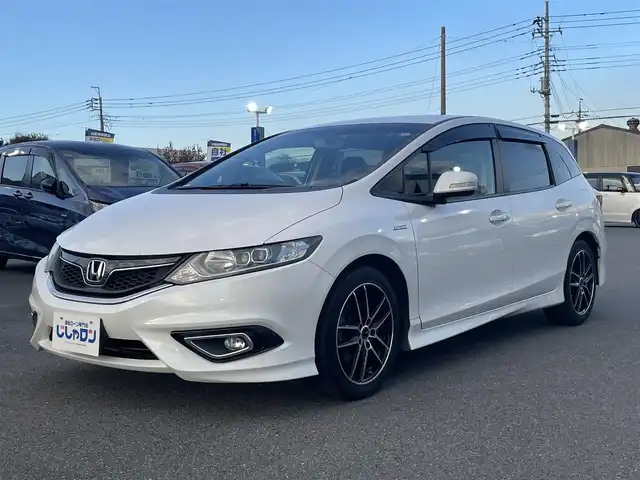 ホンダ ジェイド ハイブリッド 群馬県 2015(平27)年 11.3万km ホワイトオーキッドパール (株)IDOMが運営する【じしゃロン伊勢崎店】の自社ローン専用車両になりますこちらは現金またはオートローンご利用時の価格です。自社ローンご希望の方は別途その旨お申付け下さい/クルーズコントロール/社外SDナビ/・CD/フルセグTV/BT/DVD/バックカメラ/純正フロアマット/社外17インチAW/オートライト/LEDヘッドライト/フォグランプ/プッシュスタート/スマートキー/ビルトインETC/取扱説明書/保証書