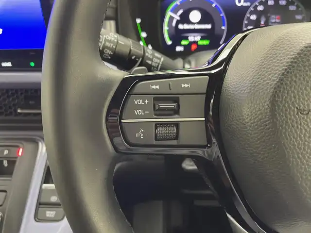 ホンダ ステップワゴン スパーダ eHEV 兵庫県 2023(令5)年 1.2万km ミッドナイトブルービームM 純正メモリナビ/（CD/DVD/SD/Bluetooth/USB/フルセグTV）/・LXM-237VFi/バックカメラ/アダクティブクルーズコントロール/LKA/ブラインドスポットモニター/コーナーセンサー（前後）/プリクラッシュセーフティー/横滑り防止装置/盗難防止装置/カーテンエアバッグ/純正フリップダウンモニター/デジタルインナーミラー/両側パワースライドドア/パワーバックドア/ハーフレザーシート/シートヒーター（D/N席）/パドルシフト/LEDフォグランプ/LEDヘッドライト/オートライト/ヘッドライトレベライザー/MTモード付AT/フルスポイラー（フロント/サイド/リア）/ドライブレコーダー（前後）/ETC/社外18インチアルミホイール/純正アルミホイール4本積込み有/社外フロアマット/純正ドアバイザー/スマートキー/3列シート/ウォークスルー