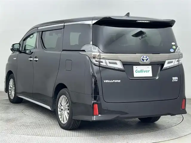 トヨタ ヴェルファイア ハイブリット Z ゴールデンアイズ 道央・札幌 2020(令2)年 6.8万km バーニングブラッククリスタルシャインガラスフレーク ・４WD/・モデリスタエアロ/・ディスプレイオーディオ/　ナビTVキット/CD/DVDデッキ/　BT/USB/Miracast/・バックカメラ/・前後ドライブレコーダー/・ビルトインETC/・トヨタセーフティセンス/・プリクラッシュセーフティ/・レーダークルーズコントロール/・レーンディパーチャーアラート/・クリアランスソナー/・オートハイビーム/・PKSB/・RSA/・両側パワースライドドア/・パワーバックドア/・ハーフレザーシート/・LEDヘッドライト/・フォグライト/・オートライト/・プッシュスタート/・スマートキー/・純正エンジンスターター/・純正フロアマット/・ドアバイザー