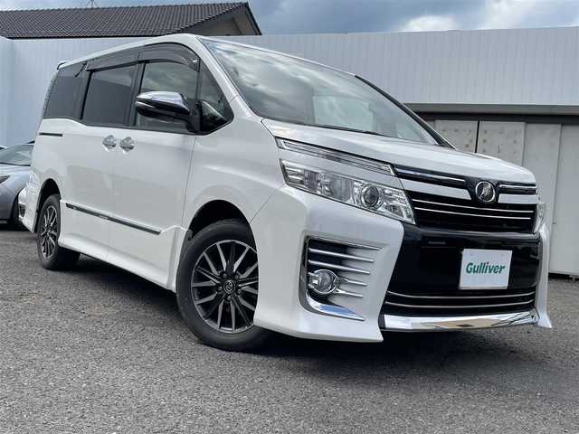 トヨタ ヴォクシー ZS 煌 福島県 2015(平27)年 10.9万km ホワイトパールクリスタルシャイン ４ＷＤ/純正ナビ/・ＣＤ/・ＤＶＤ/・フルセグＴＶ/・Ｂｌｕｅｔｏｏｔｈ/バックカメラ/フリップダウンモニター/両側パワースライドドア/ビルトインＥＴＣ/アイドリングストップ/ドアバイザー/プッシュスタート（スペアキー有）