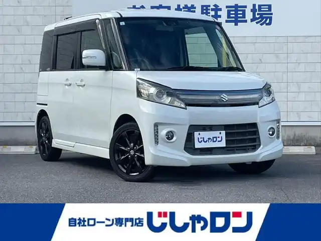 スズキ スペーシア カスタム XS リミテッド 長崎県 2015(平27)年 9.9万km パールホワイト (株)IDOMが運営する【じしゃロン長崎店】の自社ローン専用車両になりますこちらは現金またはオートローンご利用時の価格です。自社ローンご希望の方は別途その旨お申付け下さい/ナビ　/バックカメラ　/Ｂｌｕｅｔｏｏｔｈ　/フルセグ　/両側パワースライドドア　/ハーフレザーシート　/シートヒーター　/衝突被害軽減ブレーキ　/ＨＩＤヘッドライト　/フォグランプ　/プッシュスタート　/ＥＴＣ　/電格
