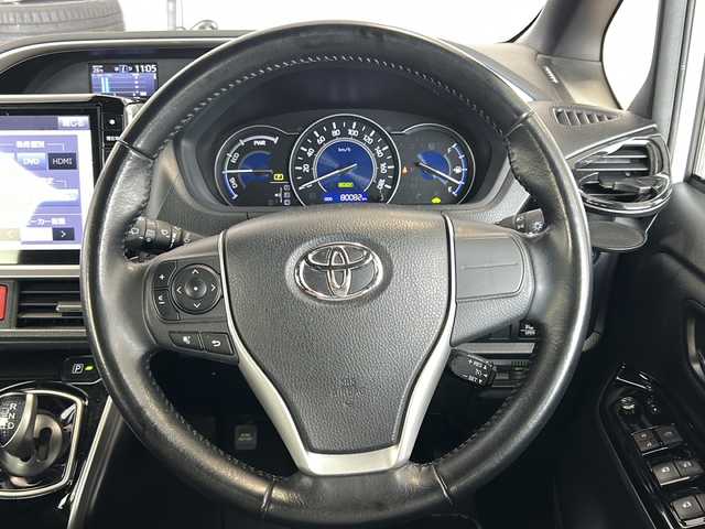 トヨタ ヴォクシー ハイブリッド ZS 煌 栃木県 2018(平30)年 8万km ホワイトパールクリスタルシャイン 純正ナビ/フルセグＴＶ/Ｂｌｕｅｔｏｏｔｈ/フリップダウンモニター/両側パワースライドドア/ＥＴＣ/クルーズコントロール/三列シート/ウォークスルー/シートヒーター/純正フロアマット/後席エアコン/USB入力端子/ABS/横滑り防止機能/レーンキープアシスト/盗難防止装置/衝突被害軽減システム/バックカメラ