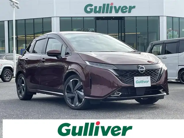 日産 オーラ G FOUR 島根県 2022(令4)年 3.4万km バーガンディー 登録時走行距離33479km/取扱説明書【車両/ナビ】/保証書/日産コネクト9インチナビ【Bluetooth/HDMI/アップルカープレイ/アンドロイドオート】/アラウンドビューモニター/プロパイロット/BOSEサウンドシステム/LEDヘッドライト/オートライト/前席シートヒーター/ステアリングヒーター/プッシュスタート/スマートキー(スペアスマート×1)/ハーフレザーシート/前後ドライブレコーダー/ビルトインETC/純正17インチAW