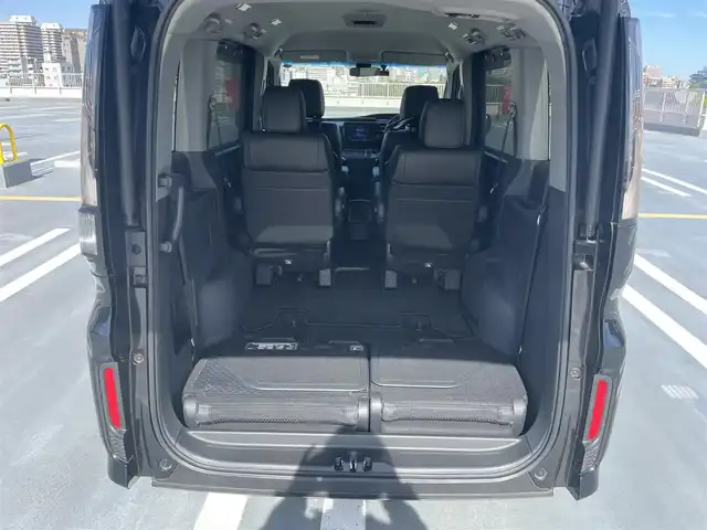 ホンダ ステップワゴン 東京都 2018(平30)年 5.4万km プレミアムスパークルブラックパール ワンオーナー/Gathers製ナビ（VXM-197VFNi)/(CD/DVD/BT/地デジTV/ミュージックラック）/バックカメラ/両側パワースライドドア/純正１６インチアルミ/LEDヘッドライト/ビルトインETC/シートヒーター/ヒーテッドミラー/社外ドライブレコーダー/純正マット・バイザー/Honda SENSING/衝突軽減ブレーキ/誤発進抑制機能/路外逸脱抑制機能/先行車発進お知らせ機能/保証書・取説