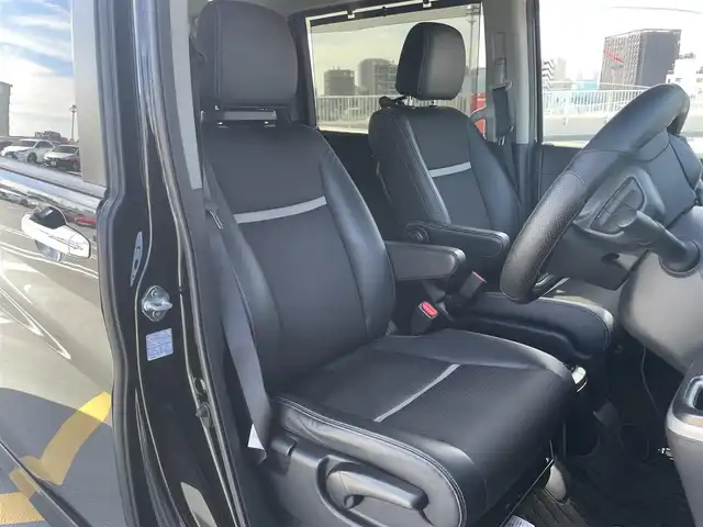 ホンダ ステップワゴン 東京都 2018(平30)年 5.4万km プレミアムスパークルブラックパール ワンオーナー/Gathers製ナビ（VXM-197VFNi)/(CD/DVD/BT/地デジTV/ミュージックラック）/バックカメラ/両側パワースライドドア/純正１６インチアルミ/LEDヘッドライト/ビルトインETC/シートヒーター/ヒーテッドミラー/社外ドライブレコーダー/純正マット・バイザー/Honda SENSING/衝突軽減ブレーキ/誤発進抑制機能/路外逸脱抑制機能/先行車発進お知らせ機能/保証書・取説