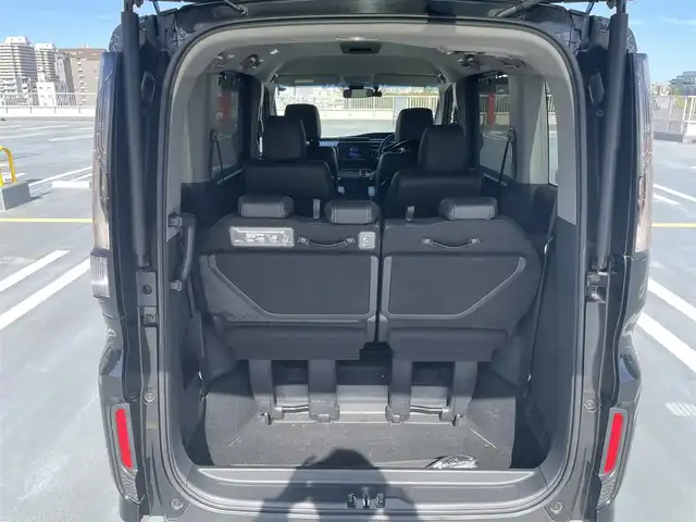 ホンダ ステップワゴン 東京都 2018(平30)年 5.4万km プレミアムスパークルブラックパール ワンオーナー/Gathers製ナビ（VXM-197VFNi)/(CD/DVD/BT/地デジTV/ミュージックラック）/バックカメラ/両側パワースライドドア/純正１６インチアルミ/LEDヘッドライト/ビルトインETC/シートヒーター/ヒーテッドミラー/社外ドライブレコーダー/純正マット・バイザー/Honda SENSING/衝突軽減ブレーキ/誤発進抑制機能/路外逸脱抑制機能/先行車発進お知らせ機能/保証書・取説