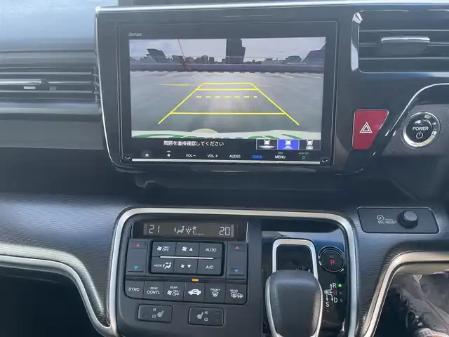 ホンダ ステップワゴン 東京都 2018(平30)年 5.4万km プレミアムスパークルブラックパール ワンオーナー/Gathers製ナビ（VXM-197VFNi)/(CD/DVD/BT/地デジTV/ミュージックラック）/バックカメラ/両側パワースライドドア/純正１６インチアルミ/LEDヘッドライト/ビルトインETC/シートヒーター/ヒーテッドミラー/社外ドライブレコーダー/純正マット・バイザー/Honda SENSING/衝突軽減ブレーキ/誤発進抑制機能/路外逸脱抑制機能/先行車発進お知らせ機能/保証書・取説