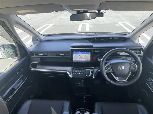 ホンダ ステップワゴン 東京都 2018(平30)年 5.4万km プレミアムスパークルブラックパール ワンオーナー/Gathers製ナビ（VXM-197VFNi)/(CD/DVD/BT/地デジTV/ミュージックラック）/バックカメラ/両側パワースライドドア/純正１６インチアルミ/LEDヘッドライト/ビルトインETC/シートヒーター/ヒーテッドミラー/社外ドライブレコーダー/純正マット・バイザー/Honda SENSING/衝突軽減ブレーキ/誤発進抑制機能/路外逸脱抑制機能/先行車発進お知らせ機能/保証書・取説