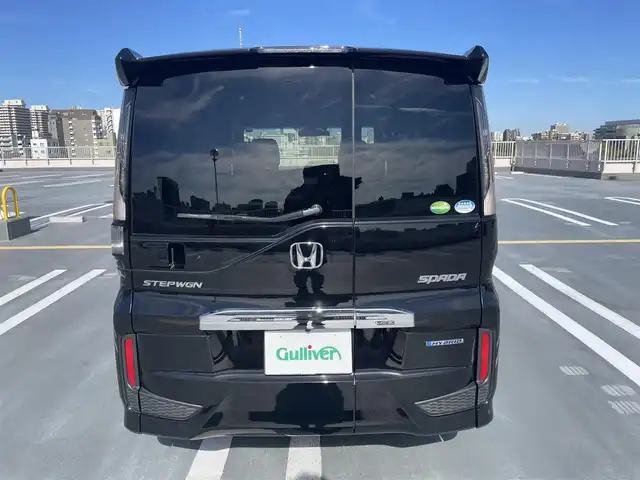 ホンダ ステップワゴン 東京都 2018(平30)年 5.4万km プレミアムスパークルブラックパール ワンオーナー/Gathers製ナビ（VXM-197VFNi)/(CD/DVD/BT/地デジTV/ミュージックラック）/バックカメラ/両側パワースライドドア/純正１６インチアルミ/LEDヘッドライト/ビルトインETC/シートヒーター/ヒーテッドミラー/社外ドライブレコーダー/純正マット・バイザー/Honda SENSING/衝突軽減ブレーキ/誤発進抑制機能/路外逸脱抑制機能/先行車発進お知らせ機能/保証書・取説
