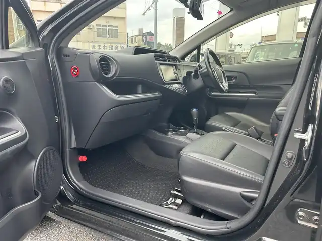 トヨタ アクア G ソフトレザーセレクション 沖縄県 2014(平26)年 6.5万km ブラックマイカ (株)IDOMが運営する【じしゃロンコザ店】の自社ローン専用車両になりますこちらは現金またはオートローンご利用時の価格です。自社ローンご希望の方は別途その旨お申付け下さい/純正ナビ　/フルセグＴＶ　/CD再生　/Ｂｌｕｅｔｏｏｔｈ接続　/ＥＴＣ　/バックカメラ　/純正フロアマット　/パワーステアリング　/アイドリングストップ　/オートライト　/プッシュスタート　/スマートキー