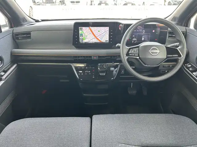 日産 サクラ X 兵庫県 2024(令6)年 0.3万km ピンク 純正9インチメモリーナビ/（CD/DVD/BT/フルセグTV）/全方位カメラ/衝突軽減ブレーキ/LEDヘッドライト/AUTOライト/フロアマット/ドアバイザー/スマートキー