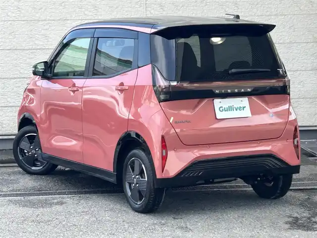 日産 サクラ X 兵庫県 2024(令6)年 0.3万km ピンク 純正9インチメモリーナビ/（CD/DVD/BT/フルセグTV）/全方位カメラ/衝突軽減ブレーキ/LEDヘッドライト/AUTOライト/フロアマット/ドアバイザー/スマートキー