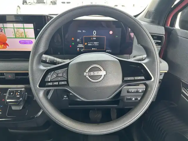 日産 サクラ X 兵庫県 2024(令6)年 0.3万km ピンク 純正9インチメモリーナビ/（CD/DVD/BT/フルセグTV）/全方位カメラ/衝突軽減ブレーキ/LEDヘッドライト/AUTOライト/フロアマット/ドアバイザー/スマートキー