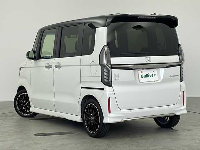 ホンダ Ｎ ＢＯＸ カスタム L ターボ コーディネートスタイル 愛知県 2021(令3)年 2.3万km プラチナホワイトパール /禁煙車//コーディネートスタイル//純正Gathersナビ(VXM-217NBi)//フルセグTV//バックカメラ//ビルトインETC//フルプライムスムースシート(アレルクリーンプラス)//外装ダーククローム加飾//内装ボルドーレッド加飾//純正15インチアルミホイール(切削加工)//ホンダセンシング//CMBS//誤発進抑制//歩行者事故低減ステア//路外逸脱抑制//アダプティブクルーズコントロール//レーンキープ//先行車発進お知らせ//標識認識//アダプティブハイビーム//パーキングセンサー//360°スーパーUV&IRカット//9灯式フルLEDヘッドライト//LEDフォグランプ//前席ベンチシート//前席シートヒーター//後席チップアップ&ダイブダウン機能付スライドシート//両側パワースライドドア//スライドドアロールサンシェード//運転席・助手席シートバックテーブル//プラズマクラスター//純正フロアマット//革巻きステアリング//ステアリングスイッチ//プッシュスタート//電動格納ミラーウィンカー
