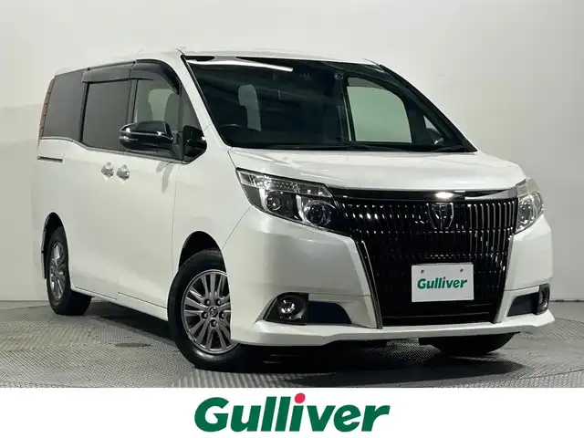 トヨタ エスクァイア Gi ブラックテーラード 大阪府 2016(平28)年 3.5万km ホワイトパールクリスタルシャイン 純正大型９インチナビ　Bluetooth　CD・DVD再生　バックカメラ　レーンキープアシスト　プッシュスタート　衝突軽減　アイドリングストップ　ビルトインＥＴＣ　両側電動ドア　ヒートシーター　レザーシート　リアオートエアコン　スマートキー　オートライト　純正ＡＷ　前後ドラレコ