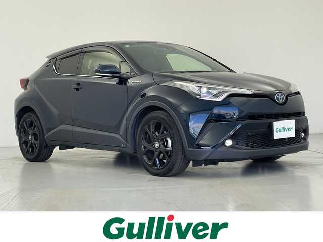 トヨタ Ｃ－ＨＲ G モード ネロ 愛知県 2018(平30)年 9.3万km ブラッキッシュアゲハガラスフレーク 純正ナビ/・Ｂｌｕｅｔｏｏｔｈ/・フルセグ/・DVD/CD/・ＨＤＭＩ/バックカメラ/前席シートヒーター/ビルドインＥＴＣ/衝突軽減/クリアランスソナー/レーンキープ/追従クルコン/ブラインドスポットモニター/オートマチックハイビーム/LEDヘッドライト/フォグランプ/純正フロアマット/純正アルミホイール/電動パーキングブレーキ/オートブレーキホールド