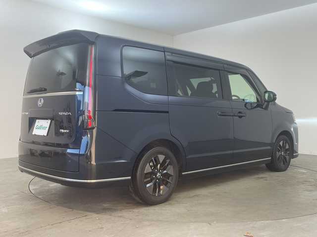 ホンダ ステップワゴン スパーダ eHEV 兵庫県 2022(令4)年 5.9万km ミッドナイトブルービームM ・純正１１．４インチナビ（LXM-237VFLi）/CD/DVD/Bluetooth/SD/USB/TV/Apple CarPlay/Android Auto/・バックカメラ/・ビルトインETC/・Honda　SENSING/・衝突軽減ブレーキ/・誤発進抑制機能/・後方誤発進抑制機能/・近距離衝突軽減ブレーキ/・歩行者事故低減ステアリング/・路外逸脱抑制機能/・アダプティブクルーズコントロール/・車線維持支援システム/・トラフィックジャムアシスト/・先行車発進お知らせ機能/・標識認識機能/・オートハイビーム/・アダプティブドライビングビーム/・ブラインドスポットインフォメーション/・両側パワースライドドア/・パワーテールゲート(メモリー機能付)/・ハーフレザー/・前席シートヒーター/・パドルシフト/・ＬＥＤヘッドライト/・ＬＥＤフォグランプ/・前後ドライブレコーダー/・スマートキー