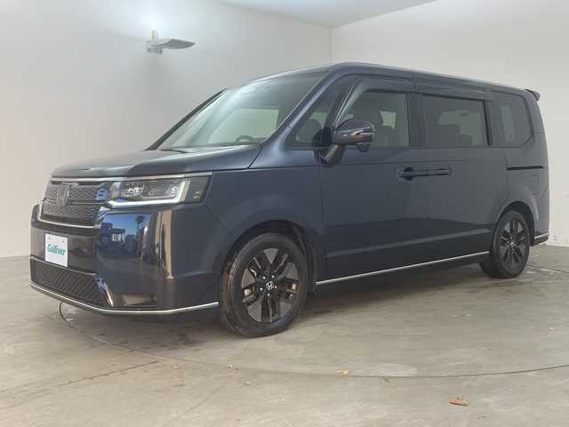 ホンダ ステップワゴン スパーダ eHEV 兵庫県 2022(令4)年 5.9万km ミッドナイトブルービームM ・純正１１．４インチナビ（LXM-237VFLi）/CD/DVD/Bluetooth/SD/USB/TV/Apple CarPlay/Android Auto/・バックカメラ/・ビルトインETC/・Honda　SENSING/・衝突軽減ブレーキ/・誤発進抑制機能/・後方誤発進抑制機能/・近距離衝突軽減ブレーキ/・歩行者事故低減ステアリング/・路外逸脱抑制機能/・アダプティブクルーズコントロール/・車線維持支援システム/・トラフィックジャムアシスト/・先行車発進お知らせ機能/・標識認識機能/・オートハイビーム/・アダプティブドライビングビーム/・ブラインドスポットインフォメーション/・両側パワースライドドア/・パワーテールゲート(メモリー機能付)/・ハーフレザー/・前席シートヒーター/・パドルシフト/・ＬＥＤヘッドライト/・ＬＥＤフォグランプ/・前後ドライブレコーダー/・スマートキー